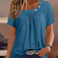 Γυναικείο περιστατικό στρογγυλό λαιμό στερεό χρώμα κουμπί στοιχείο κοντομάνικο κορυφαίο T-Shirt