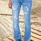 Γυναικείο Denim χαμηλή άνοδος αυξάνεται σε χαμηλή αύξηση σχισμένο κουμπί